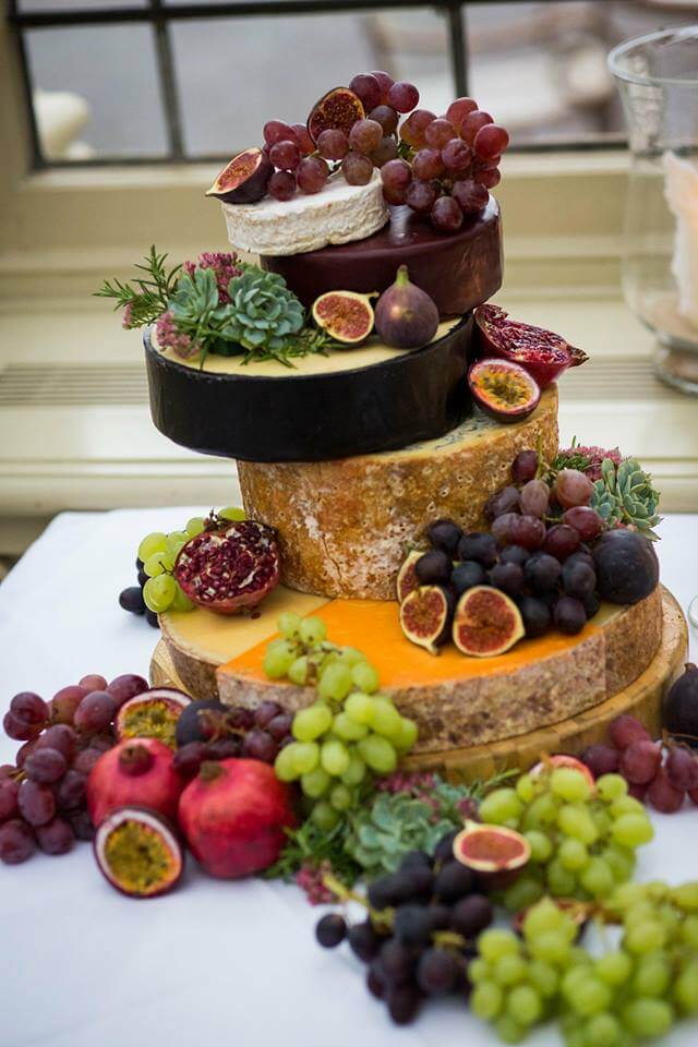 Cheese cake fruit and succulents arrangement